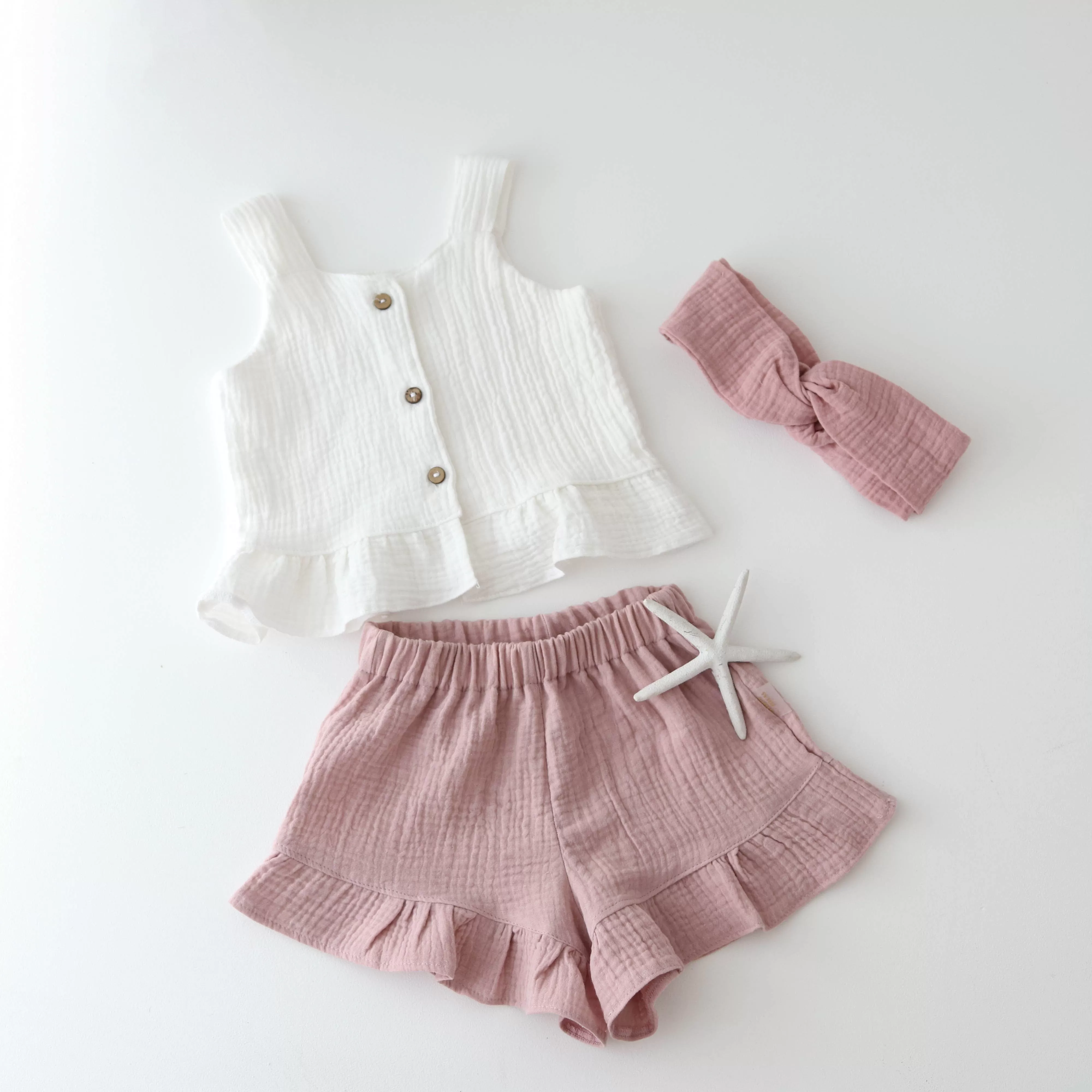 Muslin shorts with a ruffle - DUSKY PINK