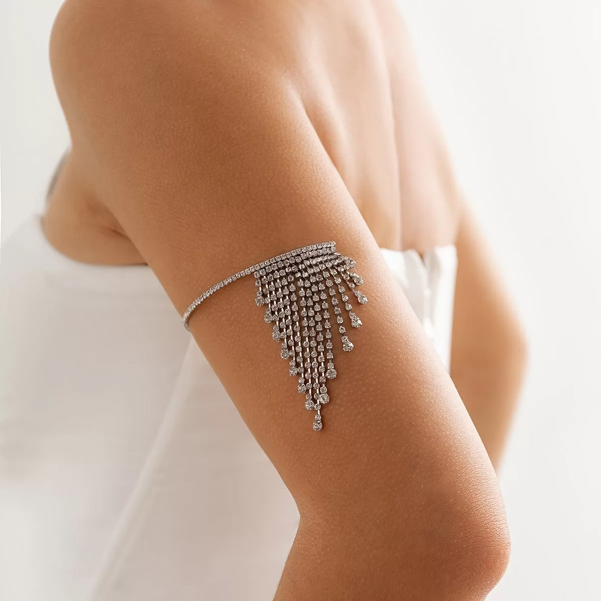 Shine Bright with our Rhinestone Tassel Chain Arm Bracelet