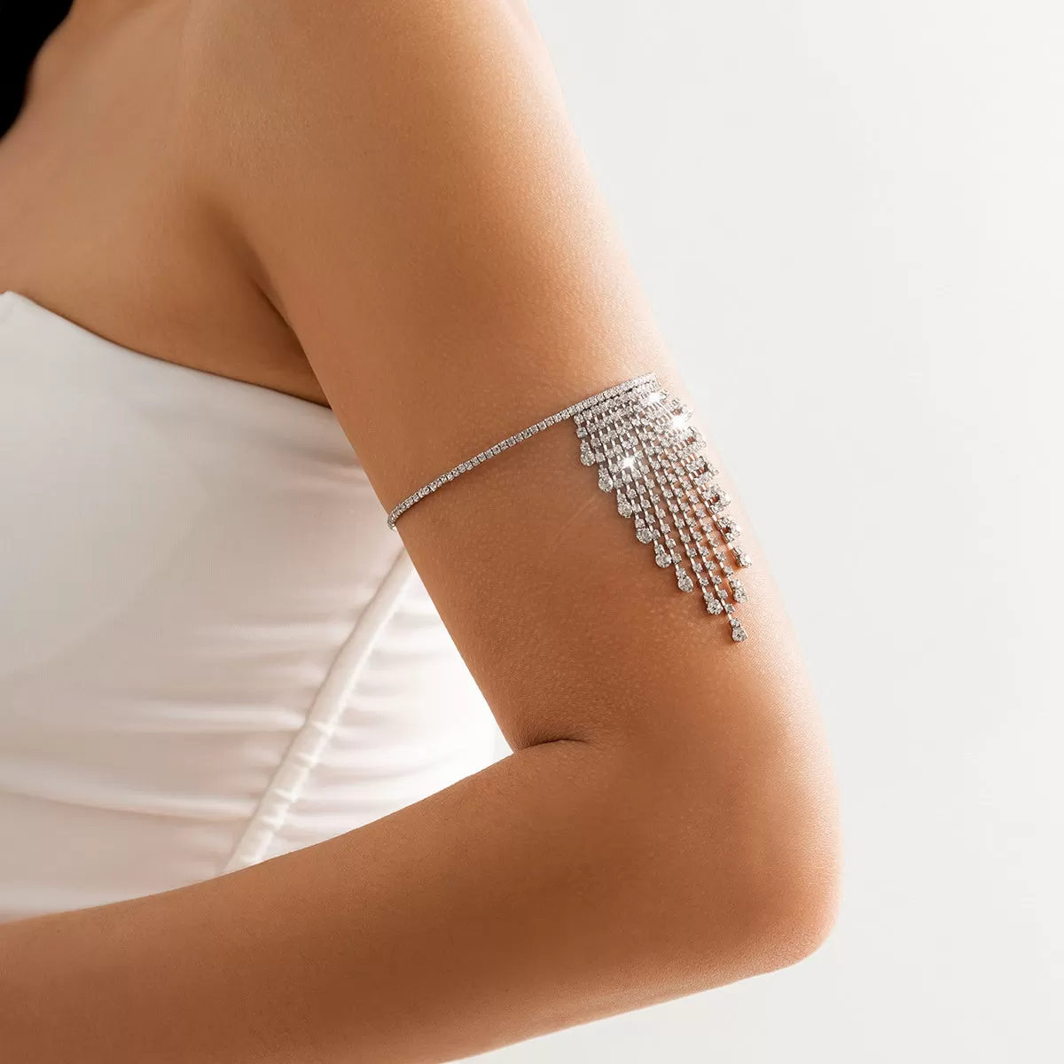 Shine Bright with our Rhinestone Tassel Chain Arm Bracelet